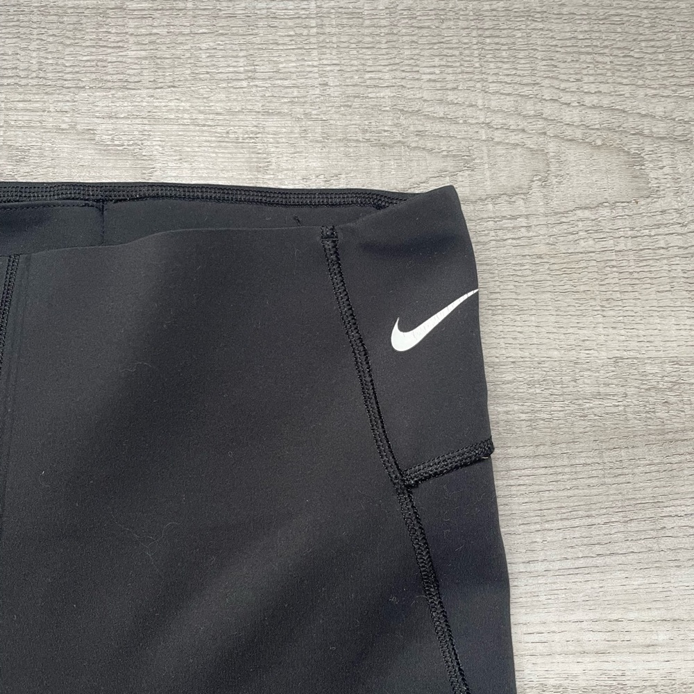 Black Nike Dri-Fit leggings. So soft and comfy.